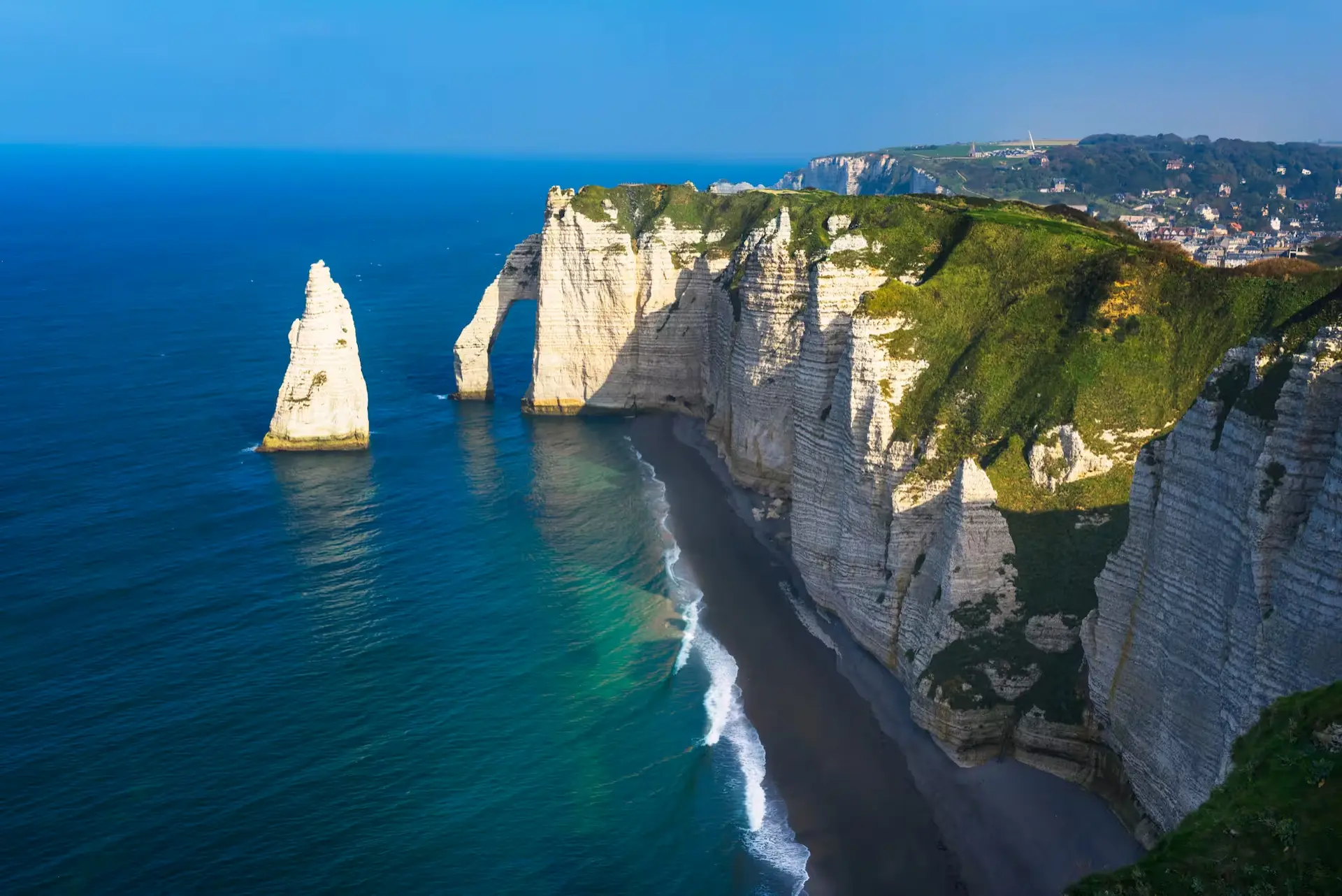 dramatic white chalk cliffs of Étretat dramatic white chalk cliffs of Étretat
